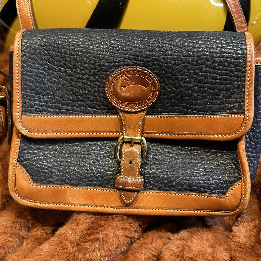 Dooney and Bourke “all weather leather “ crossbody purse